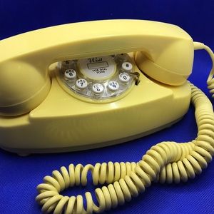 Yellow vintage Crosley phone